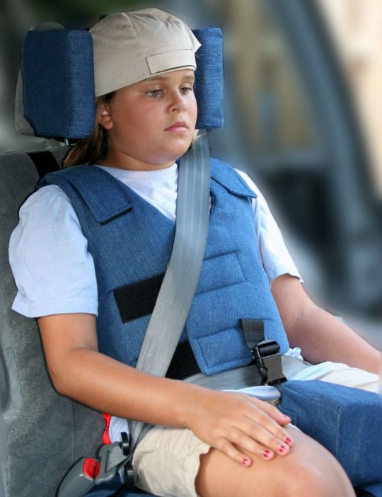 The Churchill Pediatric Positioning Car Seat with Vehicle Restraint System in use.