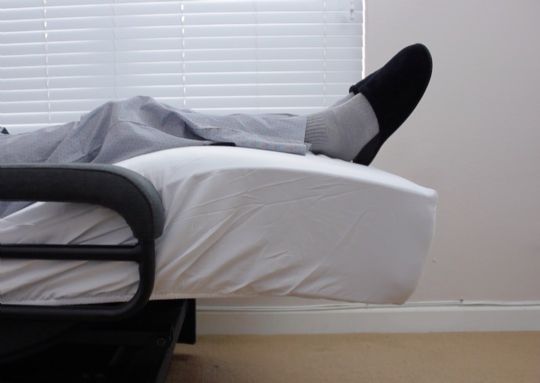 You can elevate your legs while lying supine. Elevating your feet can promote blood circulation.