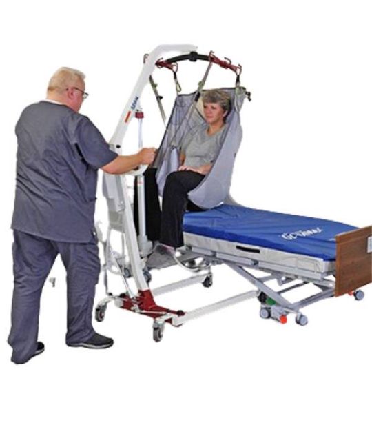 Picture shows the F500P Full Body Patient Lift in use