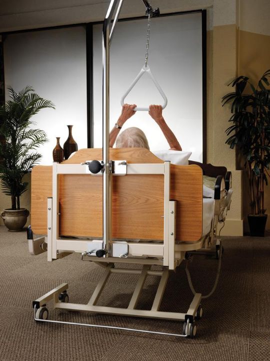 Trapeze attaches to hospital beds
