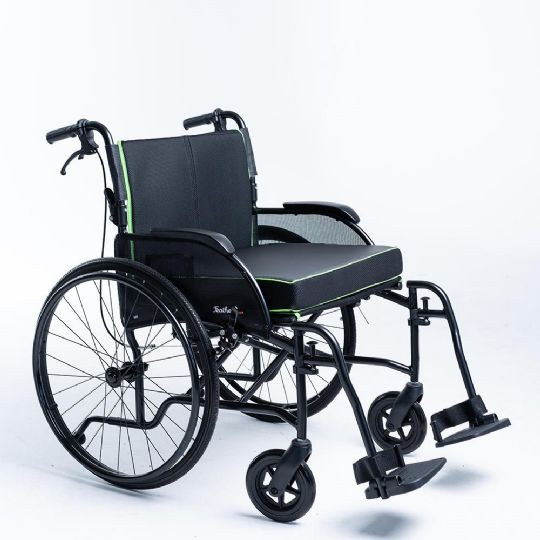 Foam Wheelchair Cushions shown in green and in use