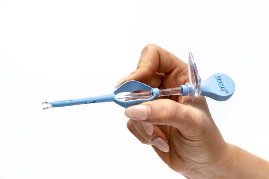 Lighted forceps in use
