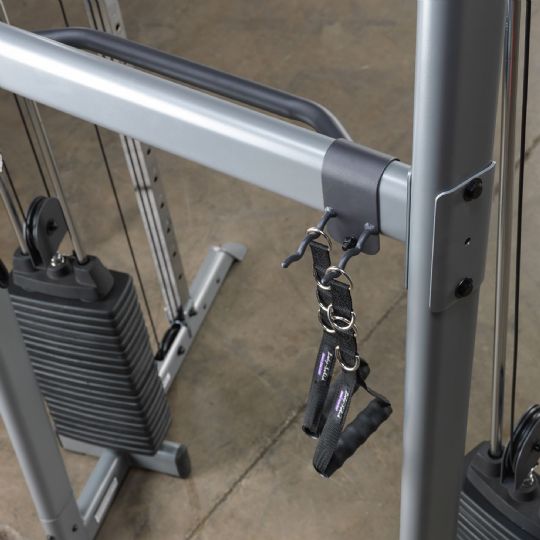 Accessory Rack slides over crossbar, locks with two bolts. Hooks for gym storage. Lifetime warranty.