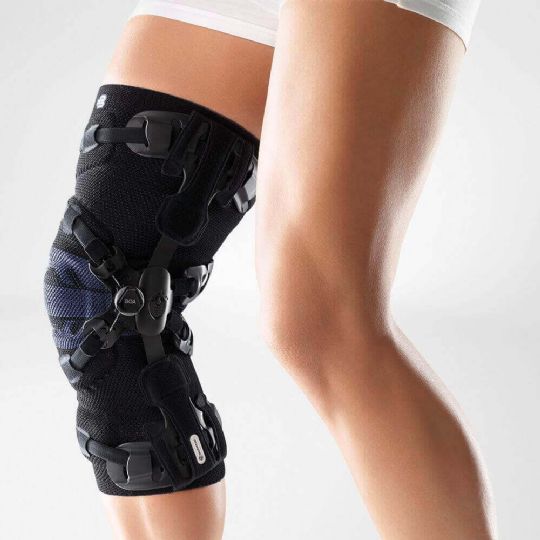 Genutrain oa knee brace offering targeted support with breathable fabric and easy-adjust boa fit system for enhanced mobility and comfort