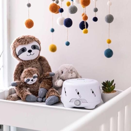 Yogasleep Dohm Uno White Noise Machine creating a soothing nursery environment