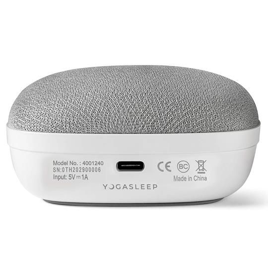 Rear view of the Yogasleep Travelcube white noise machine showing the USB charging port and model details