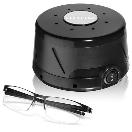 Compact Yogasleep Dohm DS White Noise Machine shown with glasses for scale