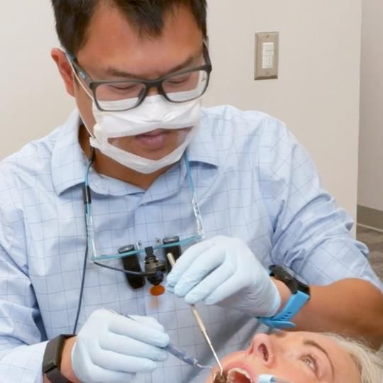 Dentist wearing a Safe N Clear surgical mask