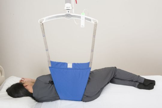 GoLift offers a variety of slings. This sling is called GoTurn. It is used to turn patients to either side to relieve bed sores. (Sling sold separately)
