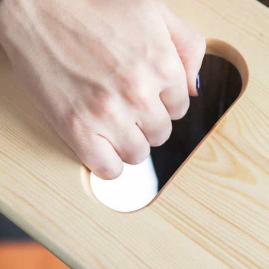 Two cut-out on each sides of the board for a better grip