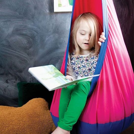 The Indoor Hanging Pod Sensory Swing is great for book nooks!