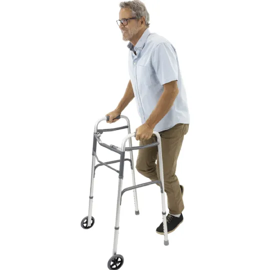 Man walking with a lightweight adjustable walker featuring wheels