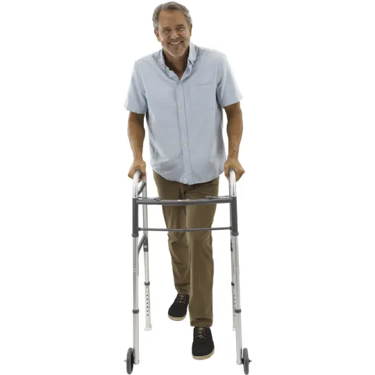 Smiling man using a lightweight walker with wheels for mobility