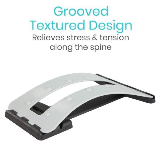 Grooved textured back stretcher for relieving spinal stress and tension