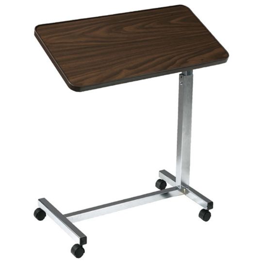 This is a portable overbed table with a walnut wood-grain laminate top and a silver frame.