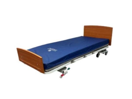 View of the bed and mattress with no rails, optional rails available