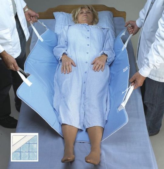 Skil-Care TLC Positioning Pads for Patient Transfer and Positioning in use 
