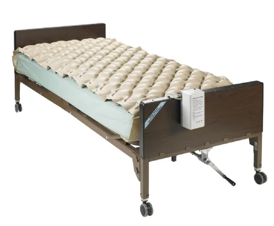 Variable Pressure Pump and Deluxe Pad with End Flaps securely in place, wrapped around the mattress