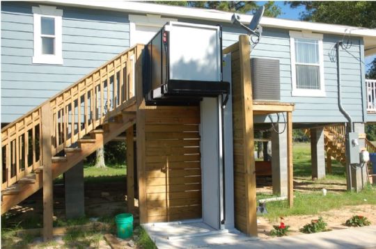 Butler RAM Lift used on a lifted home for safety and access during floods