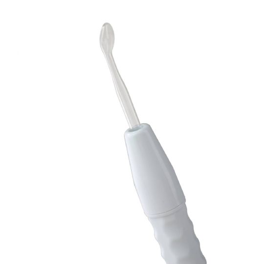 Close-up view of the small pink spoon electrode for precise skin care