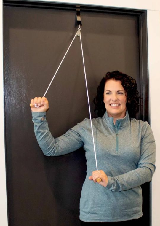 The Shoulder Pulley is Hooked to a Door Frame and is used for Moving