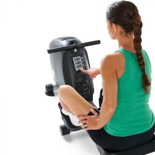 Rowing machine in use