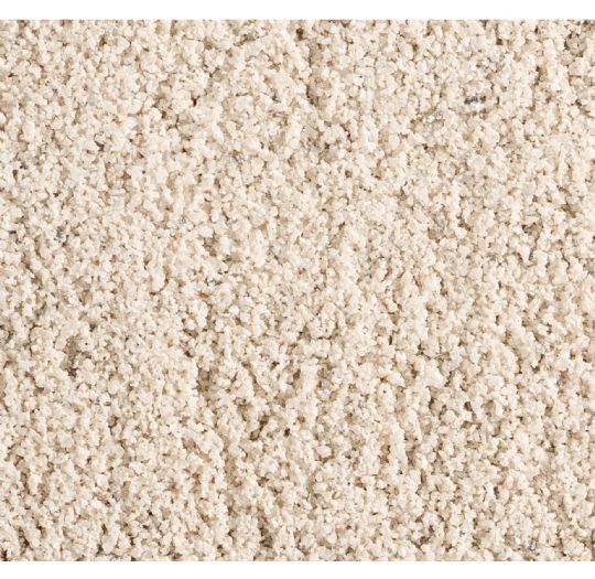 Detailed texture of natural rock salt granules on the omi salt board in white