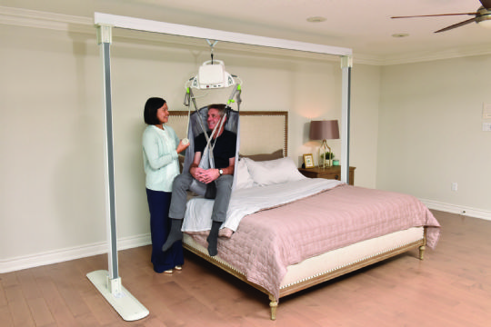 Savaria Monarch Portable Ceiling Lift picture shows what the lift will look like in use