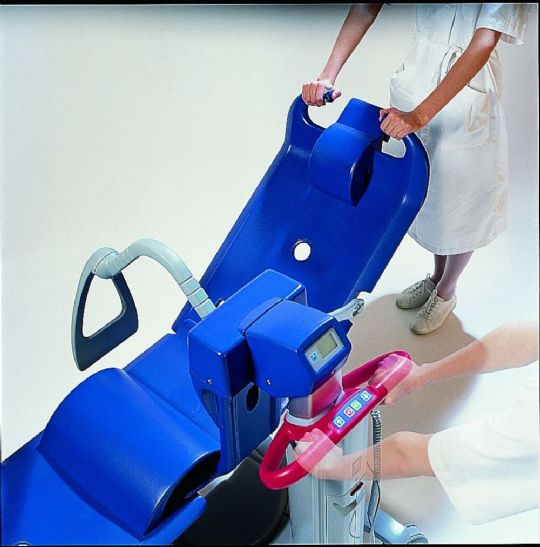 Caregivers can direct the stretcher via ergonomic grips at the head or the curved handle on the mast for precise positioning