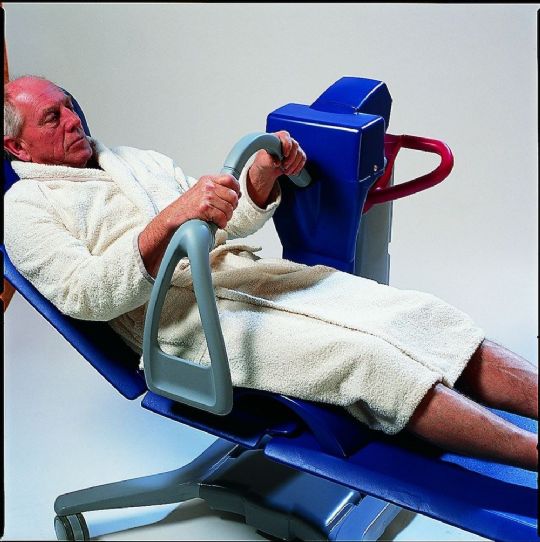 A swing-away handle won't obstruct transfers and gives patients a reassuring handhold during movement
