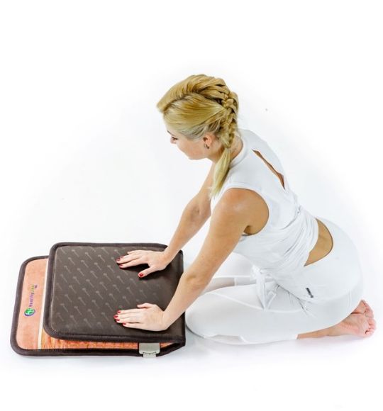 The PEMF Therapy TAO Chair Mat can be folded in half for easy storage when not in use.
