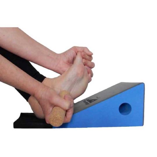 Using thermawedge with cork roller for cross-friction foot massage