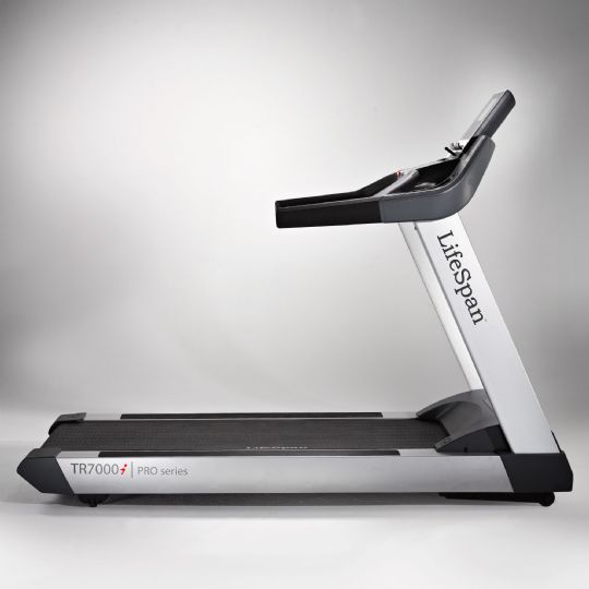 Side view of the TR7000i Commercial Treadmill 