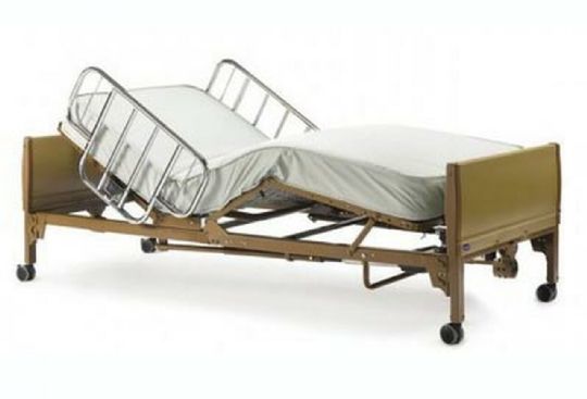 Bed shown with mattress and bed rails attached - Each sold separately 