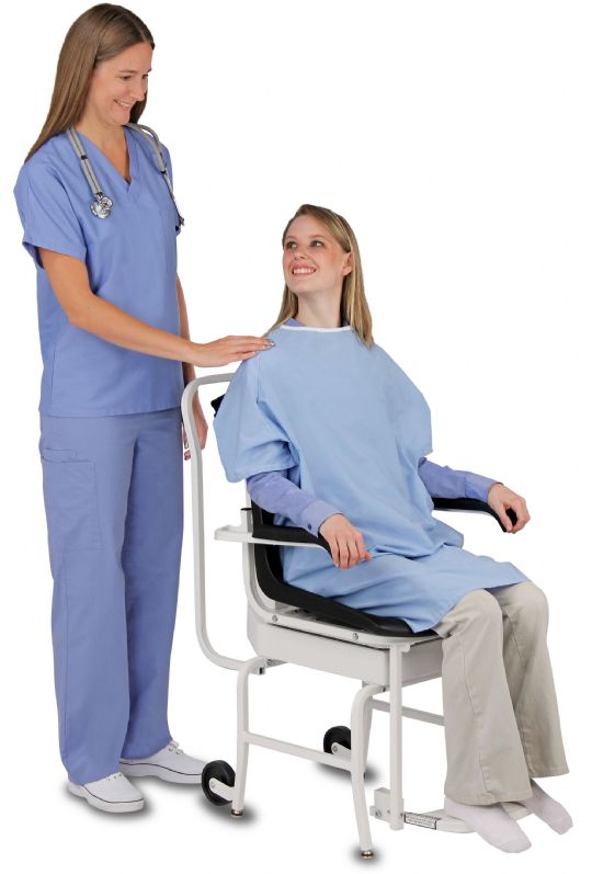 Nurse and patient enjoying small talk while using the Detecto Digital Chair Scale