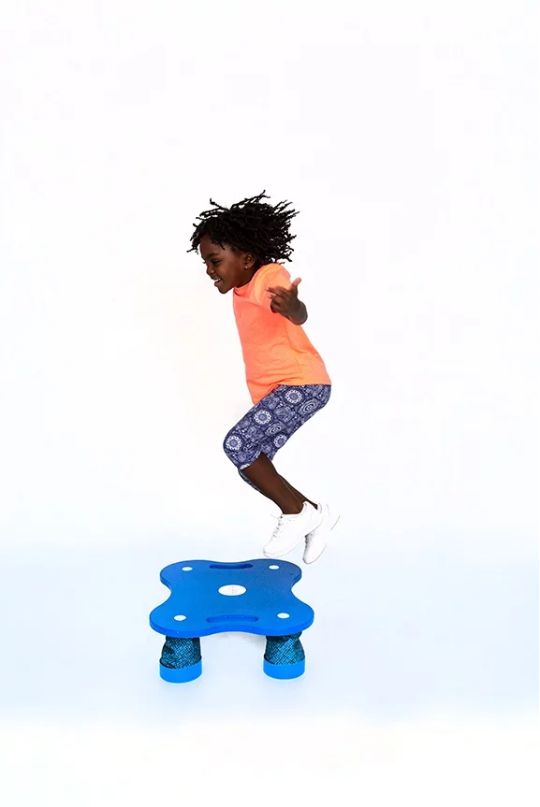 Child jumping on the Action Based Learning Station