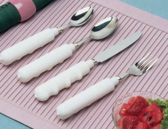 The Comfort Hand Non-Slip Grip Utensils used at a picnic