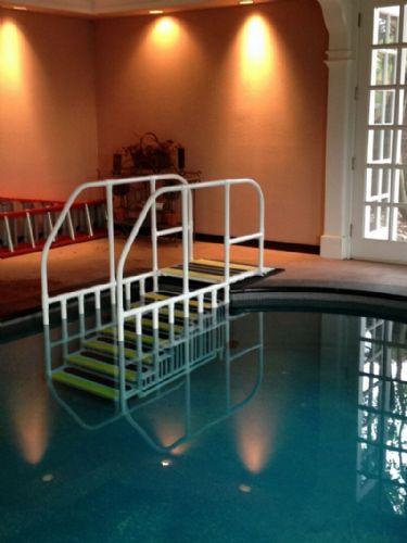 The AquaTrek Pool Ladder will fit atop pool stairs.