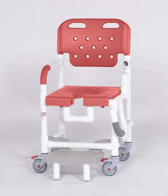 Shown in red color option, shown with footrest extended and drop arm dropped.